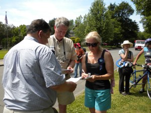 Mary Verner, Richard Rush, and Bob Apple deliberate